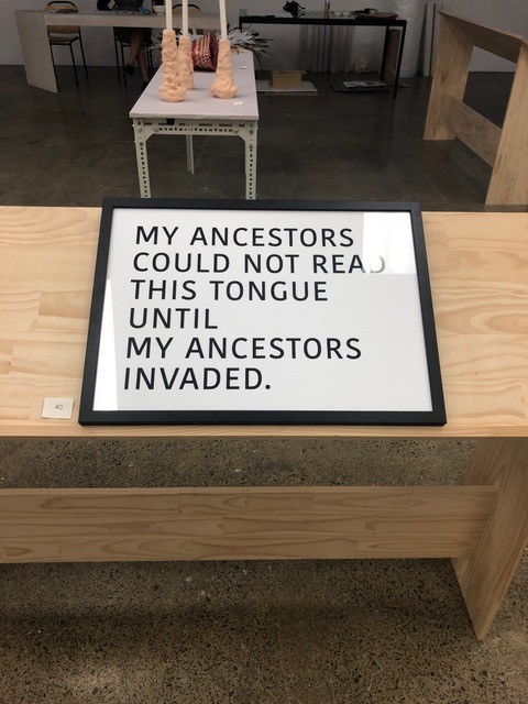 A framed black and white printed text