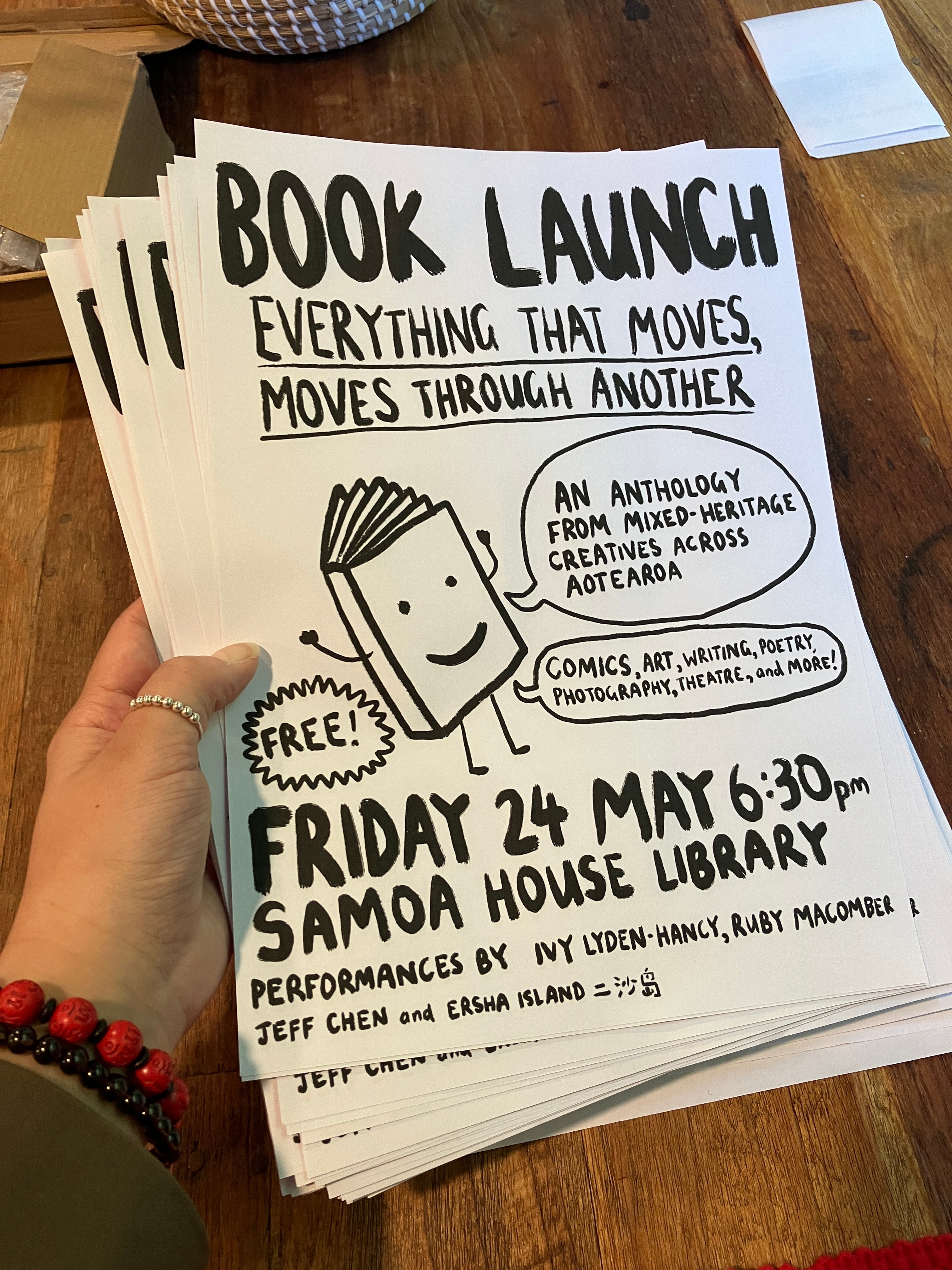 Hand-drawn poster with a smiling book.