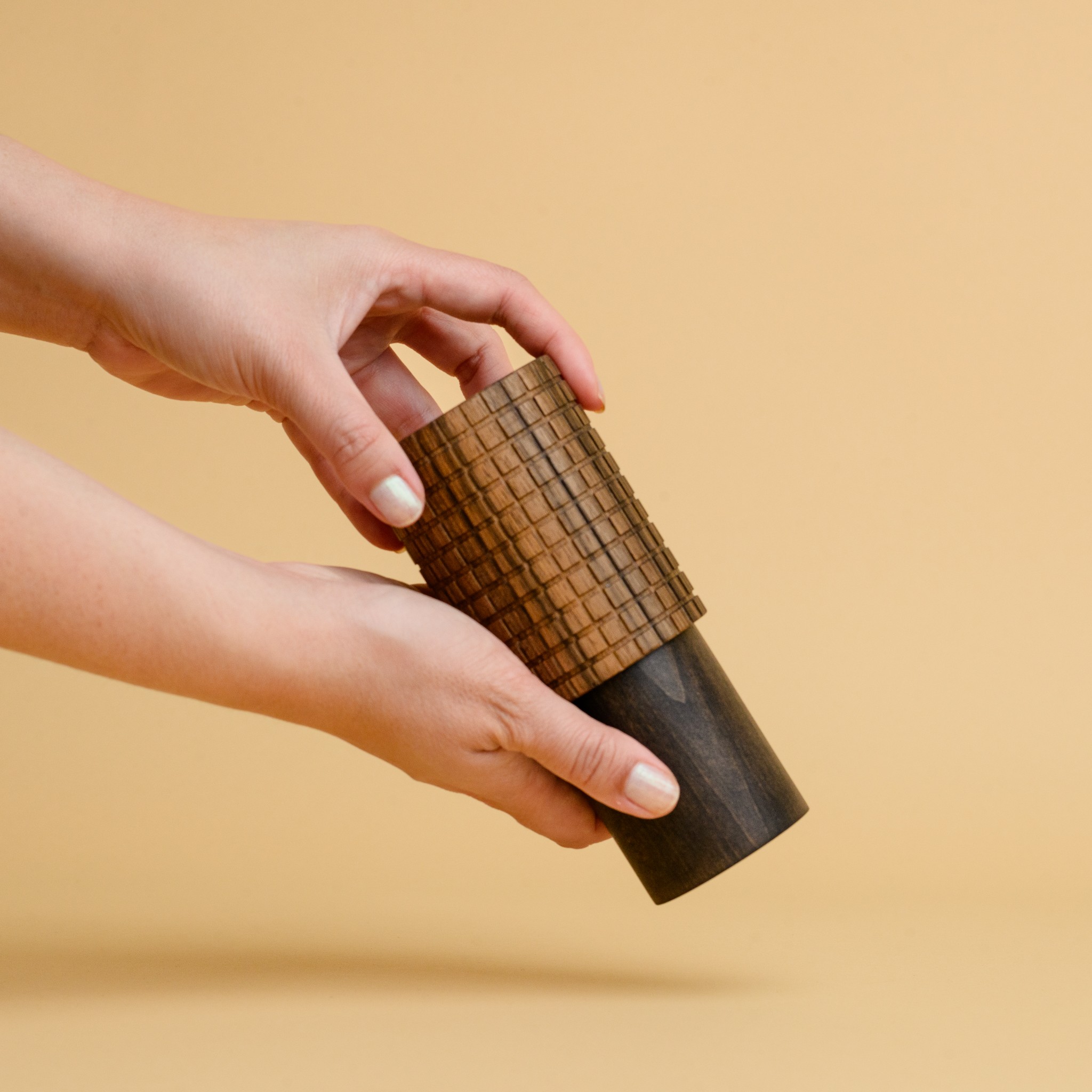 A hand-crafted wooden mill for salt or pepper