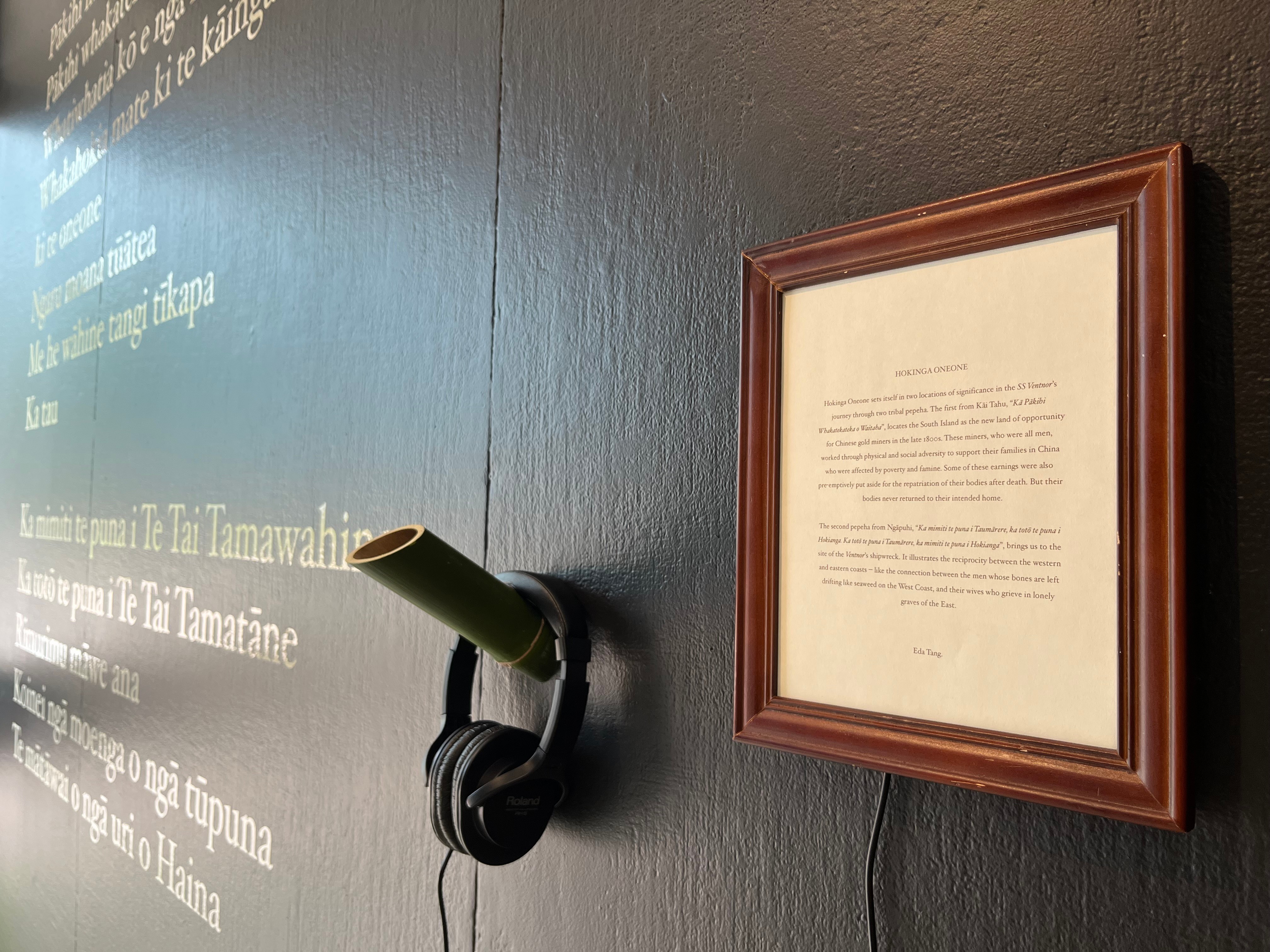 Install shot featuring headphones on a wall 