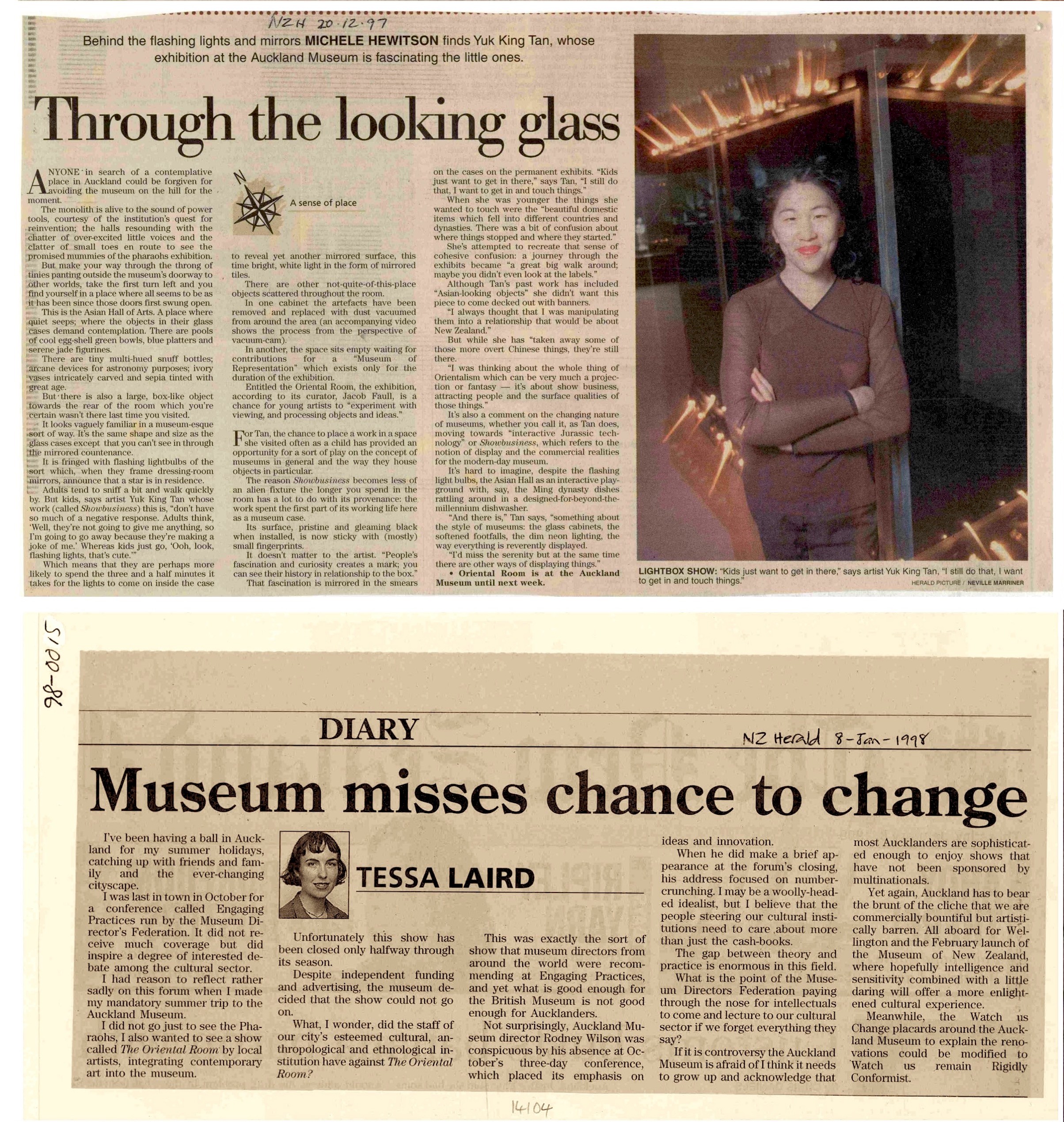 Two newspaper clippings. One showing Yuk King Tan in front of a lit-up exhibit, and another with the headline 'Museum misses chance to change'.