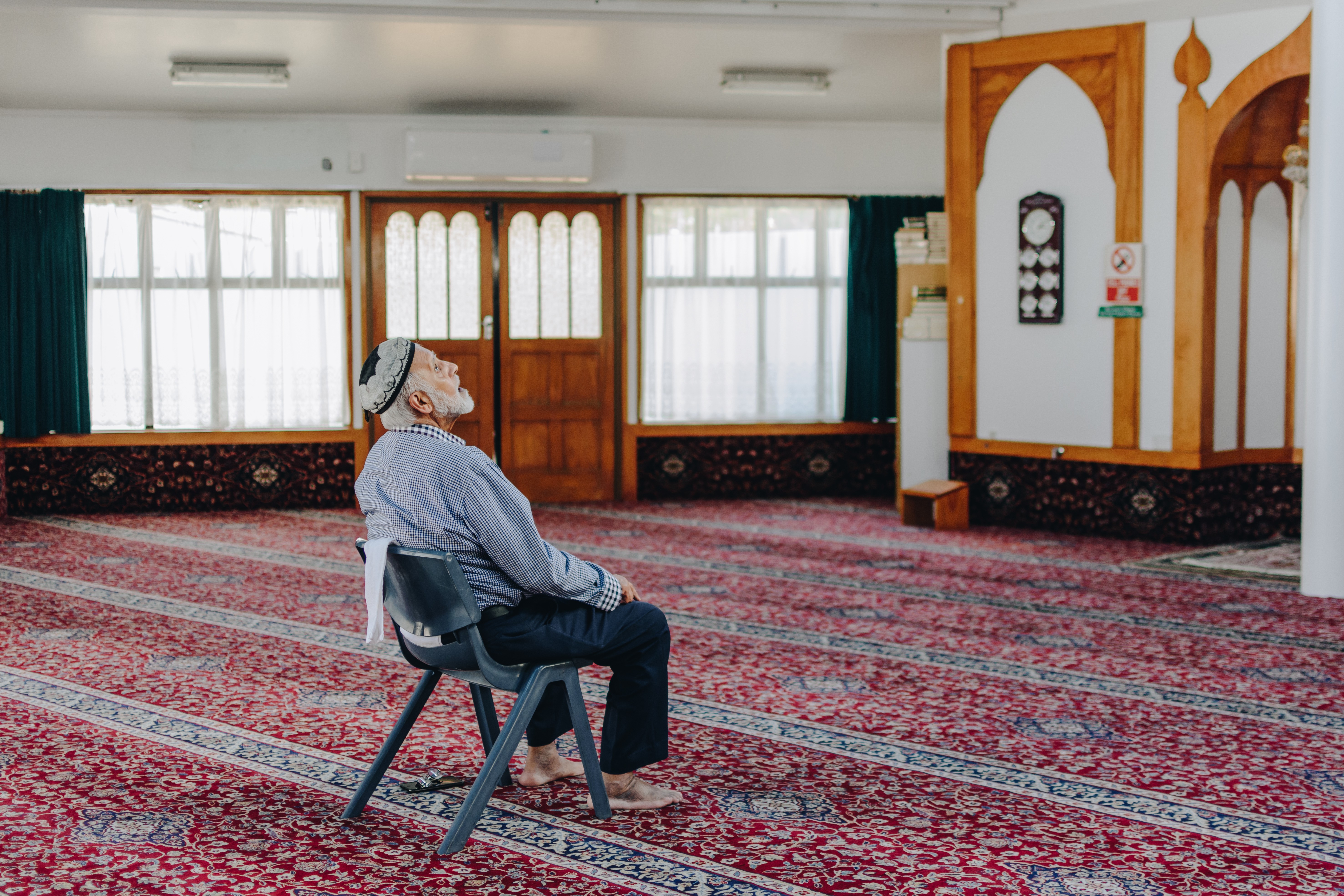 In a scene from 'This Is Us', a man looks up at the ceiling of a mosque.