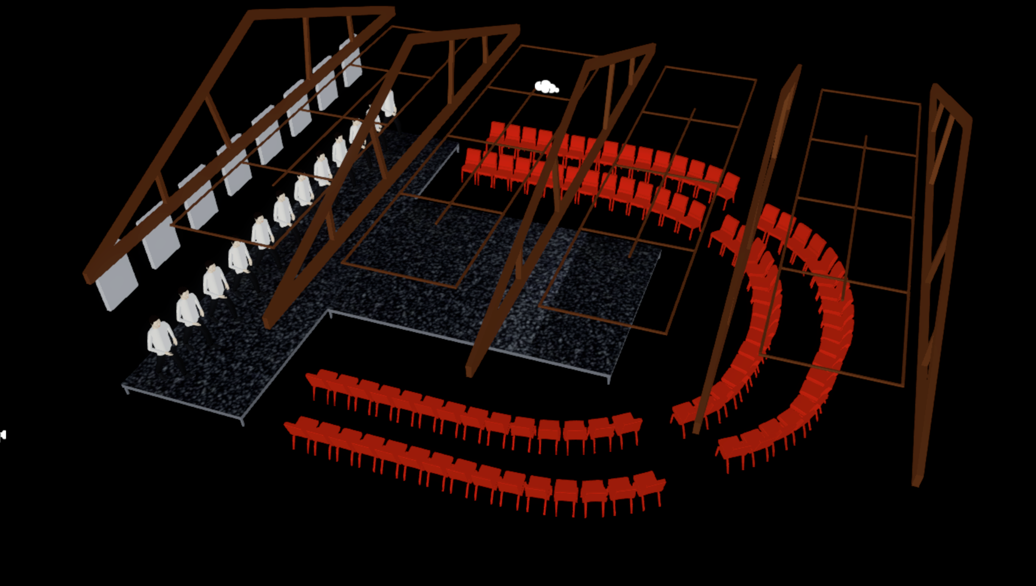 A semi-circle of red chairs surrounding a T-shaped stage 