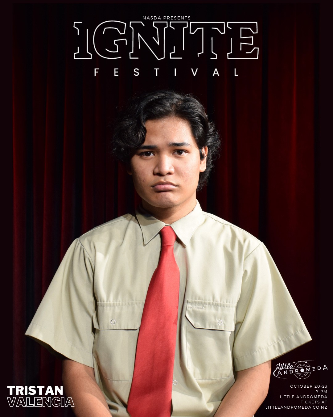 Frowning Filipino-looking person wearing khaki short-sleeved shirt with orange neck tie 