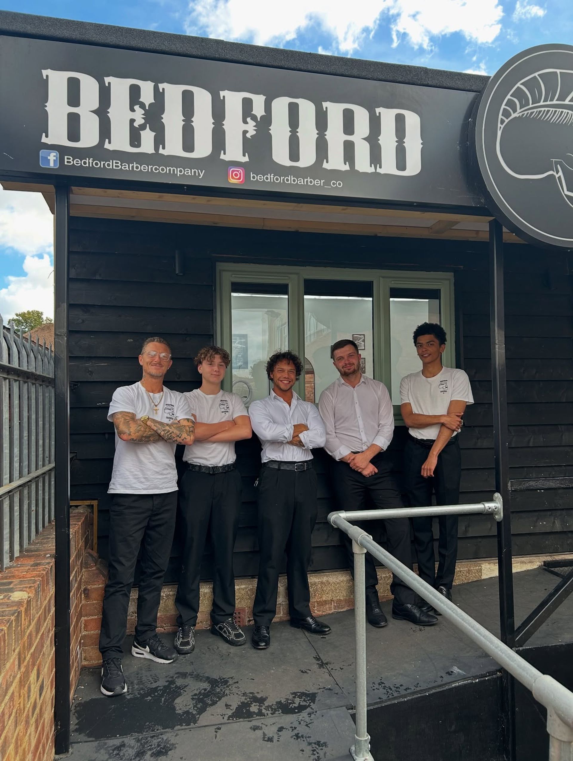 The Bedford Barber Co team outside the shop on Miller Road