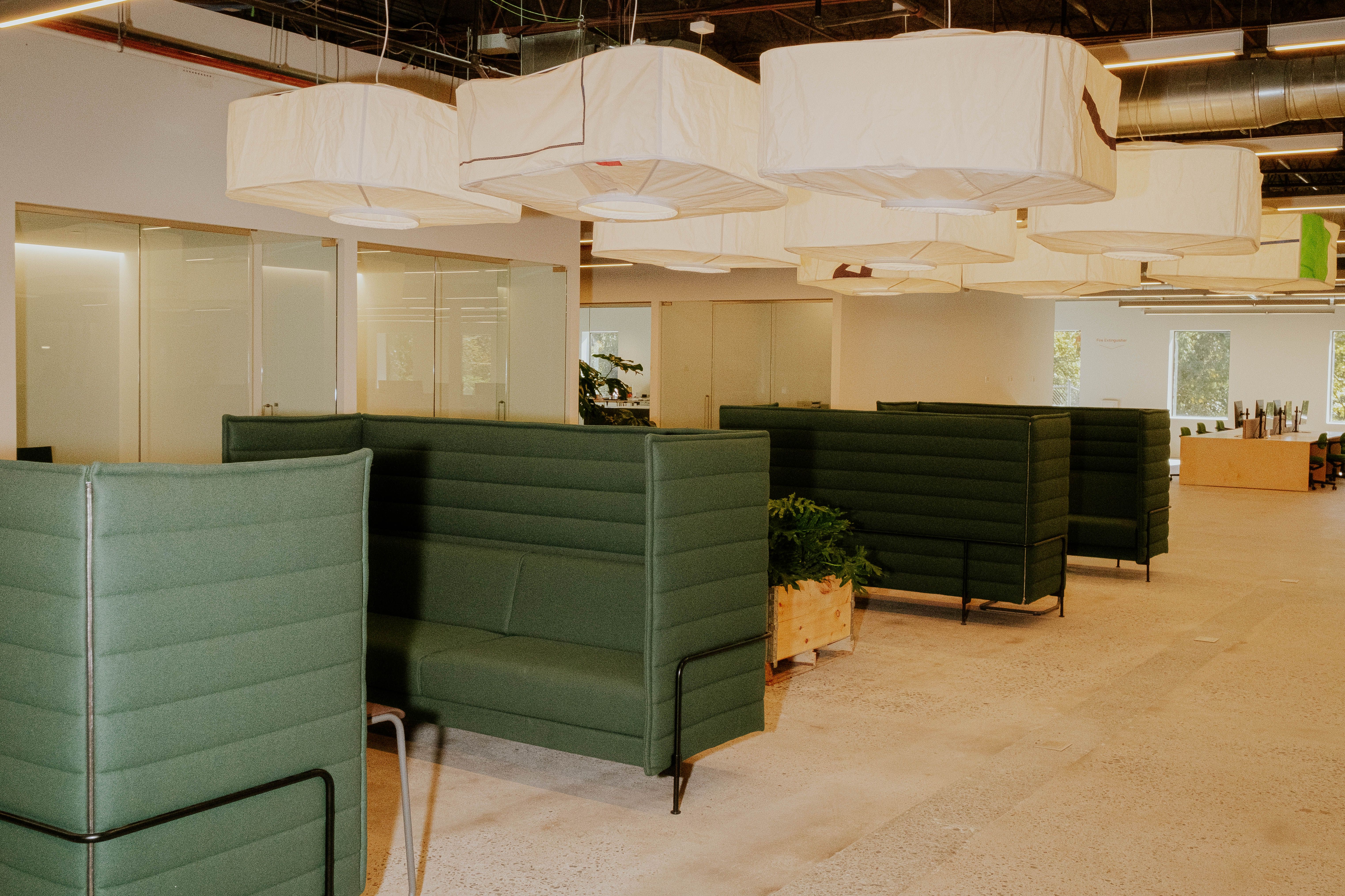 RBW Factory lounge with green Vitra furniture and AllSew pendants