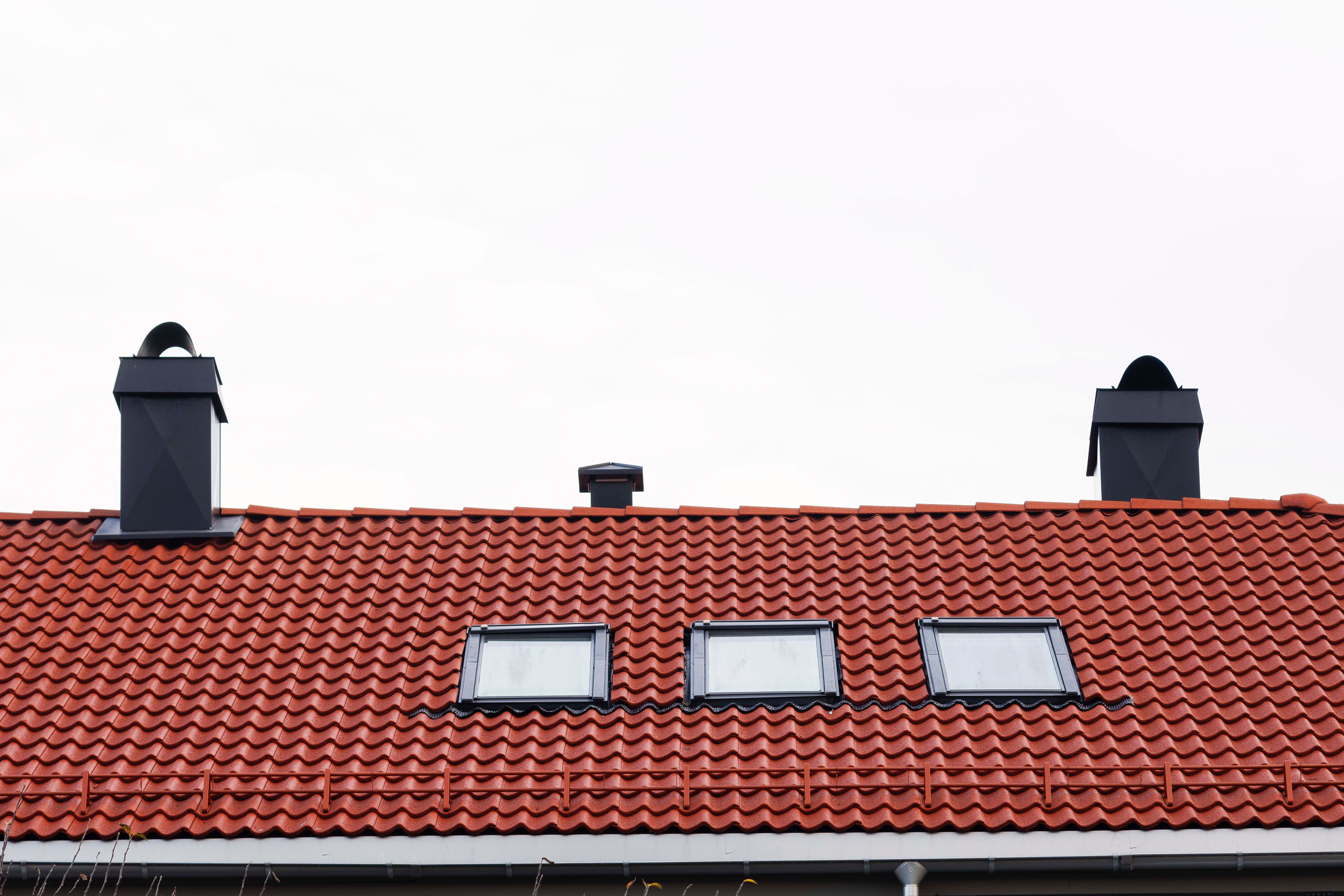 Nytt tak med nye takvinduer og rød takstein