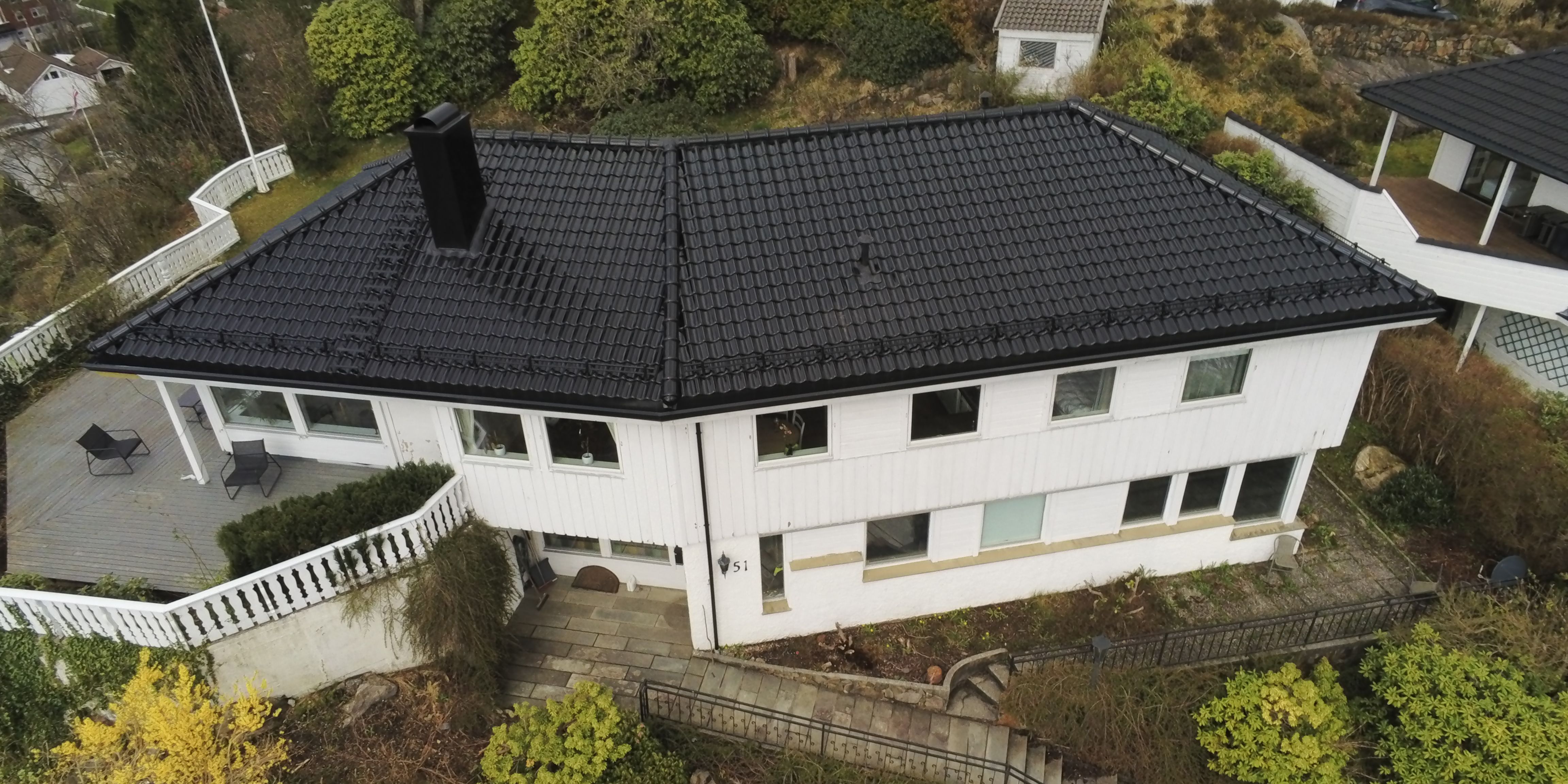 Takbytte enebolig Bergen sort glassert teglstein