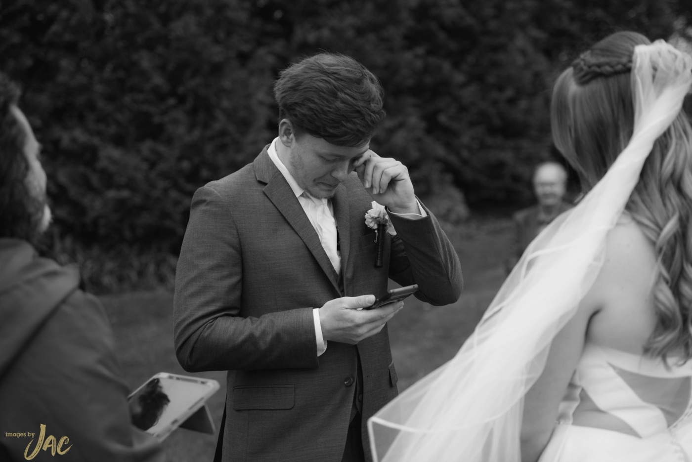 Joseph and Kim photographing a wedding