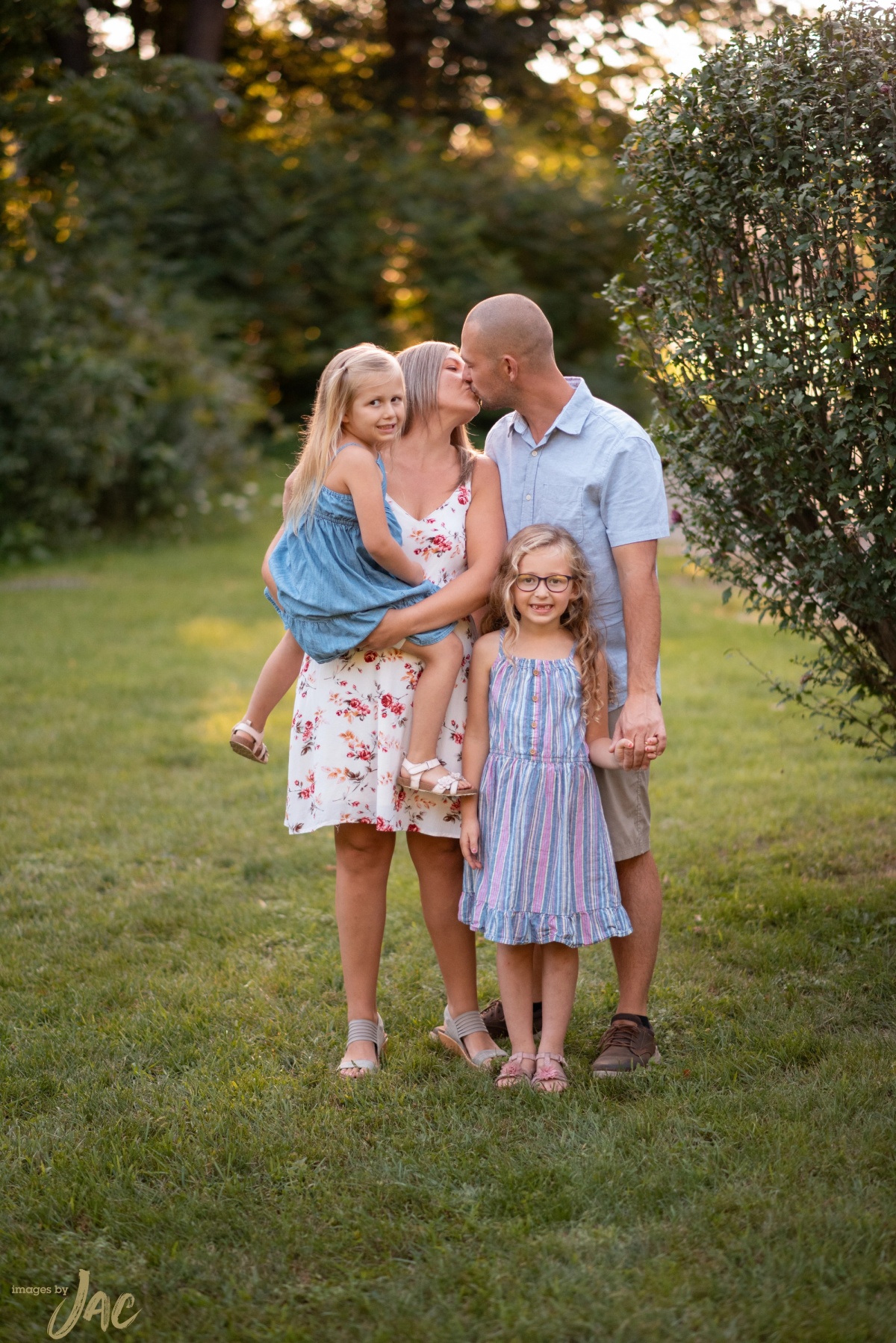 Family photo of parents and kids
