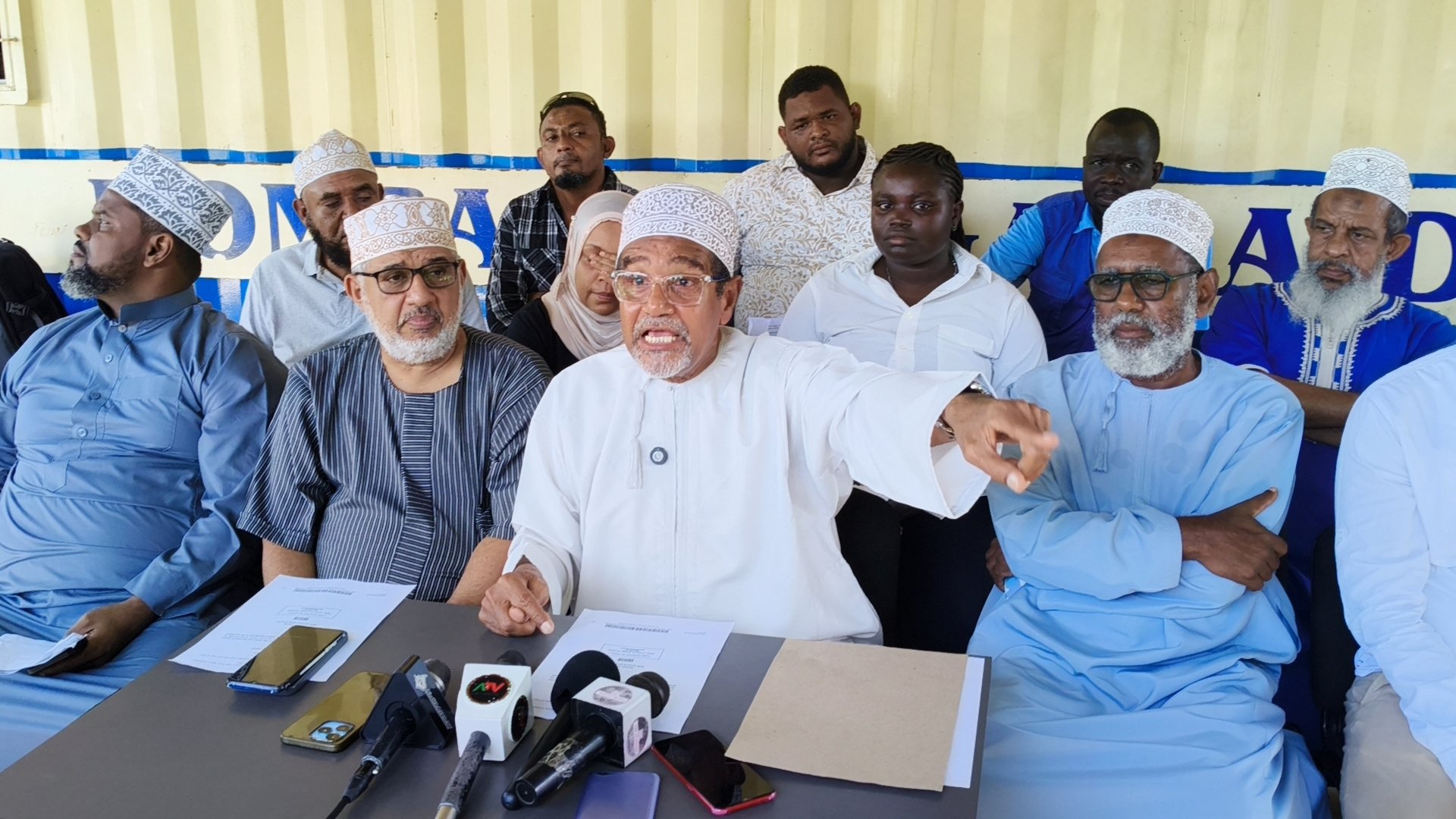 MUHURI director Khelef Khalifa speaks at a press briefing accompanied by community leaders from Lamu