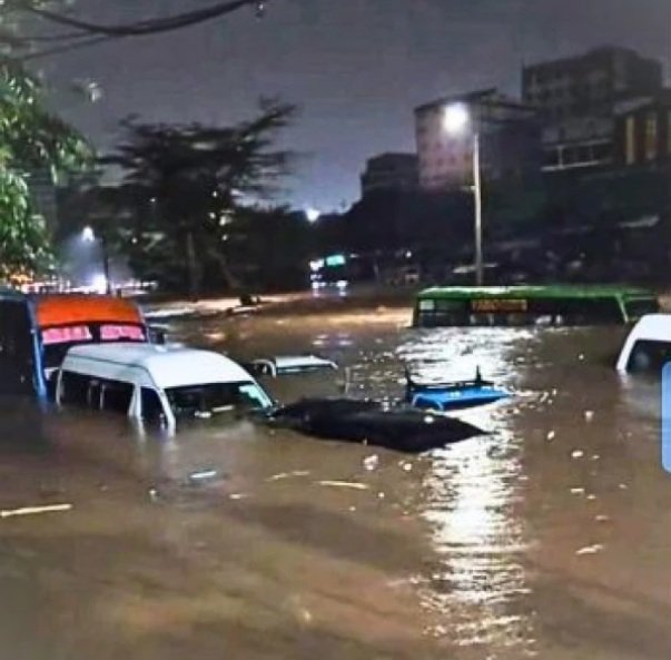 Vehicles submerged during yesterday's floods in Nairobi