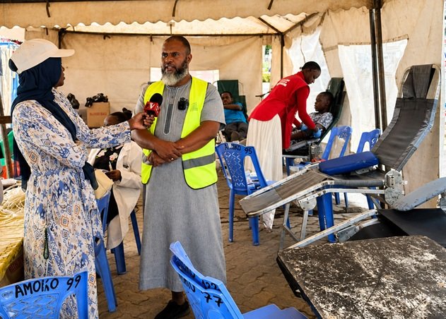 Al Ameen chief executive officer Ali Khalid speaks to the press during the blood donation exercise