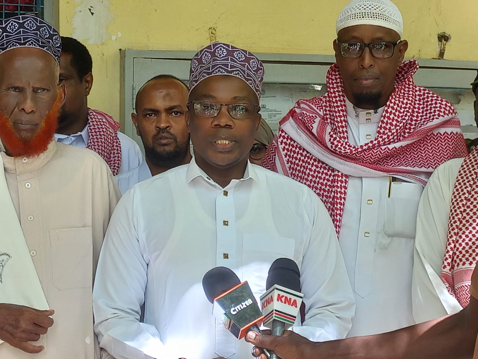 Garissa County Commissioner Mohamed Mwabudzo addressing the press with religious leaders