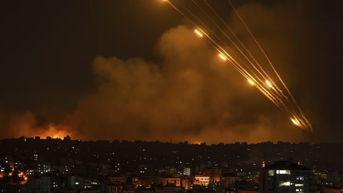A torrent of Iranian missiles lights up the night sky in Israel