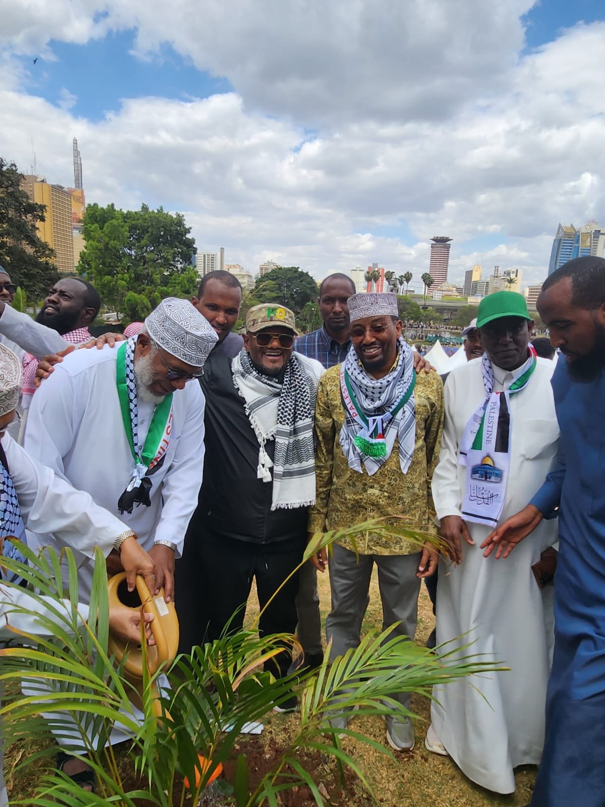 The Jamia mosque vice chairman Abdullatif Essajee waters a tree at Uhuru Park during the Gaza solidarity event on September 21. He is accompanied by member of the East African African Legilstive  Assembly (EALA) Hassan Omar and former Mandera Senator Billow Kerrow among other guests. 