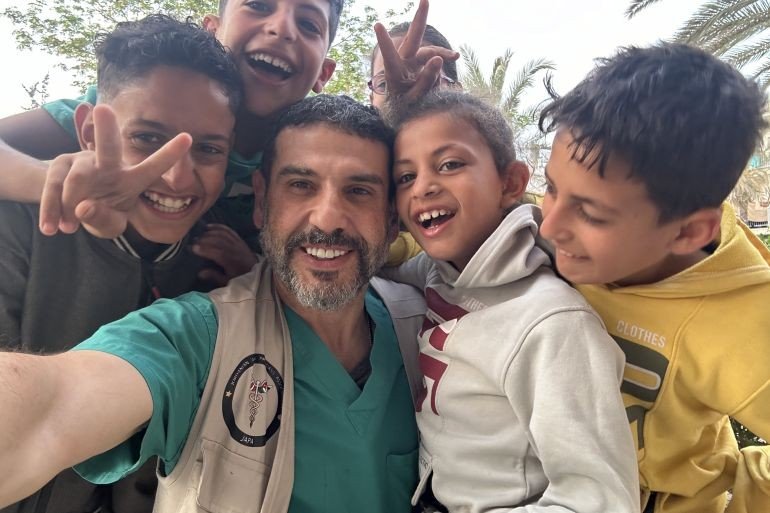 Dr. Adam Hamawy poses for a photo on a medical mission 