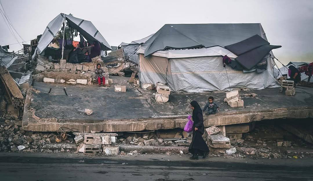 A destroyed building in Gaza turned into a makeshift shelter