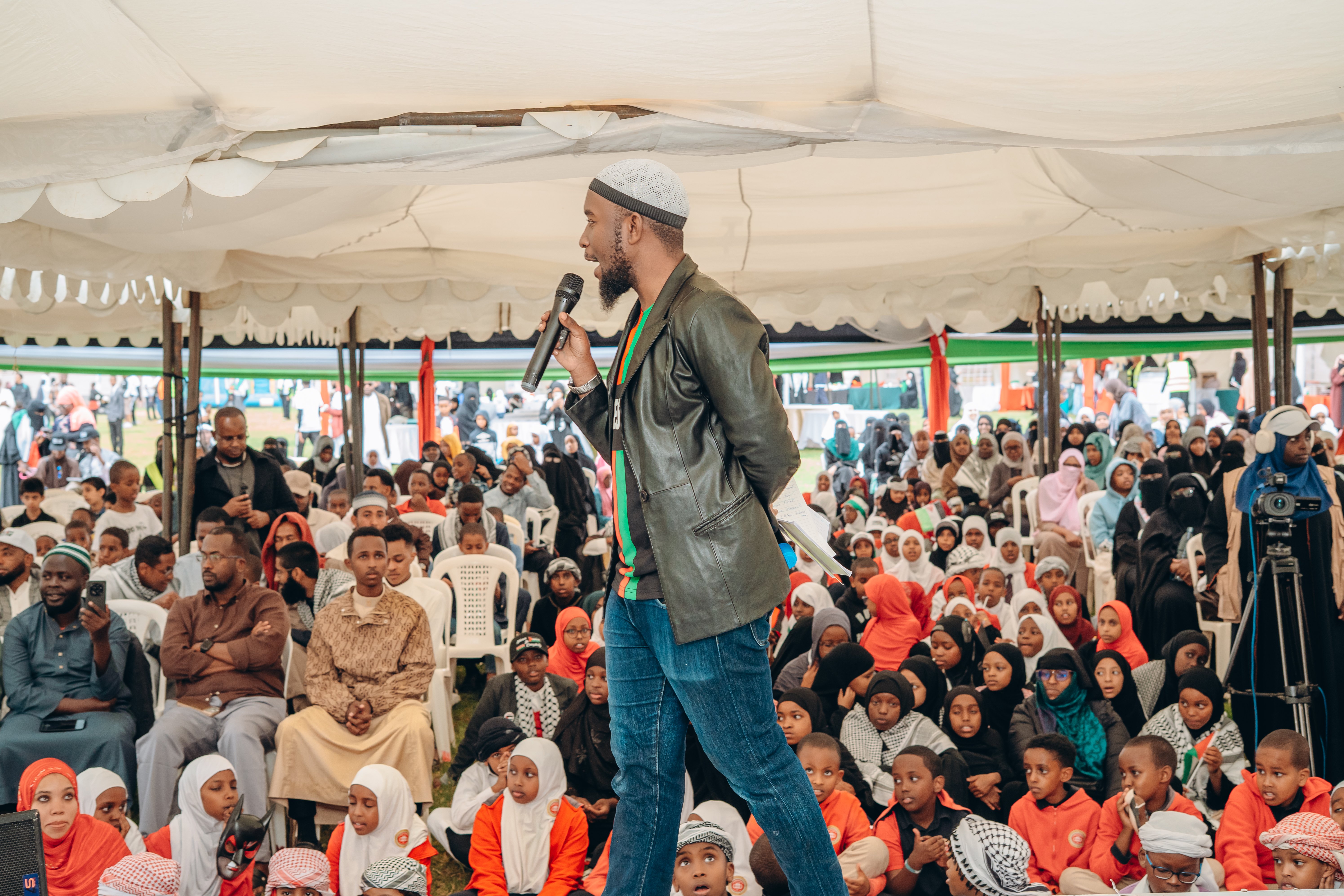 Motivational speaker Hamzah Hassan addresses participants at the event