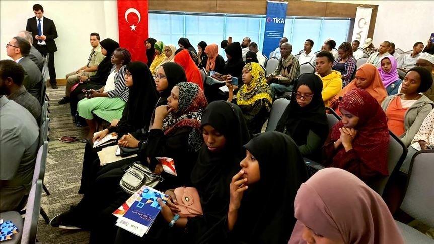 Kenyan students seeking information on Turkiye scholarships during a forum organised by the Turkish Cooperation and Coordination Agency (TIKA)