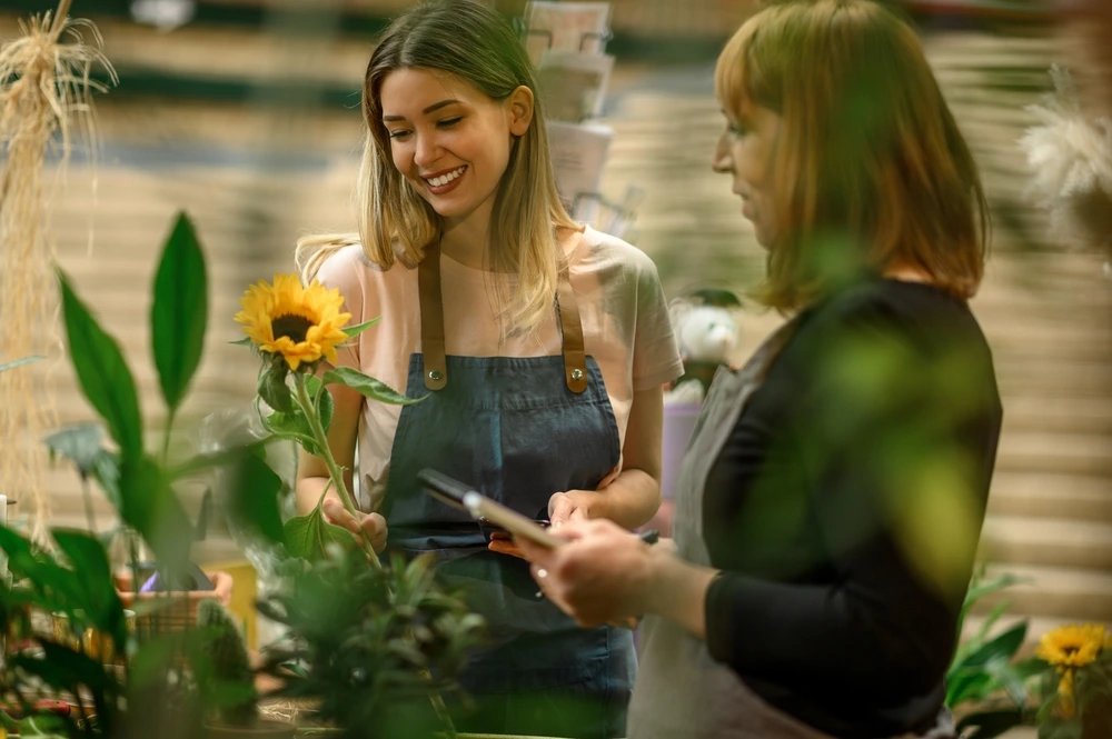 Small business owner reviewing commercial property and equipment in a Charleston SC area business where commercial property insurance may help protect physical assets against covered losses.