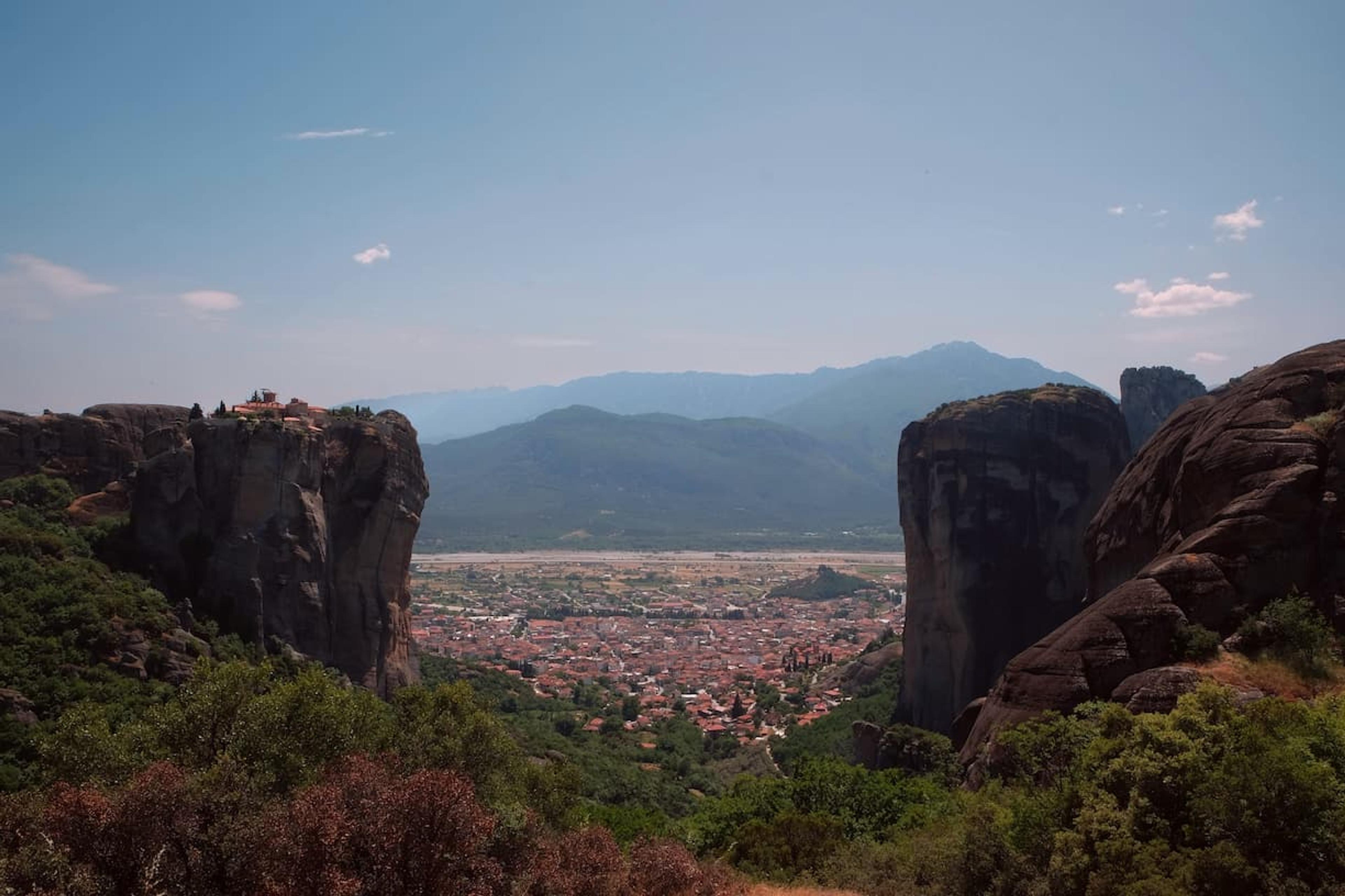 towering rocks, and holy trinity church on the top