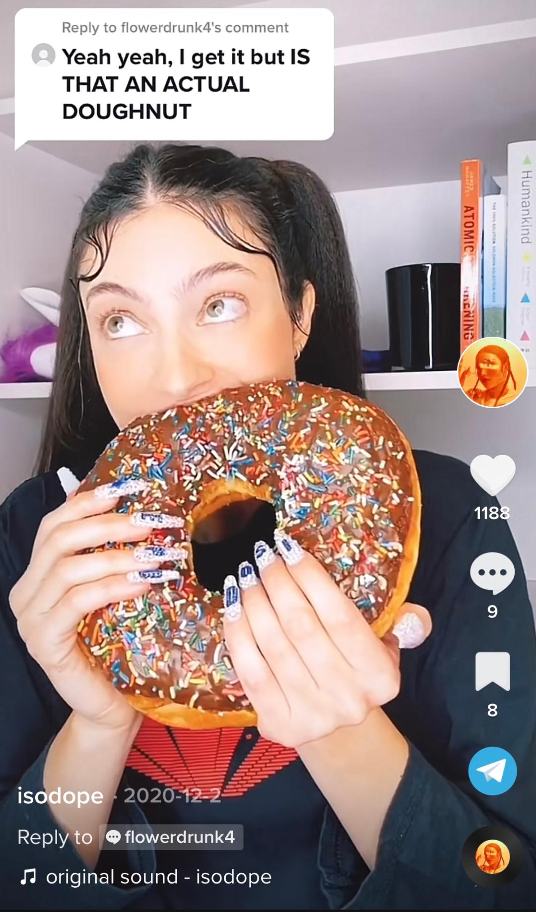 Woman eating a doughnut