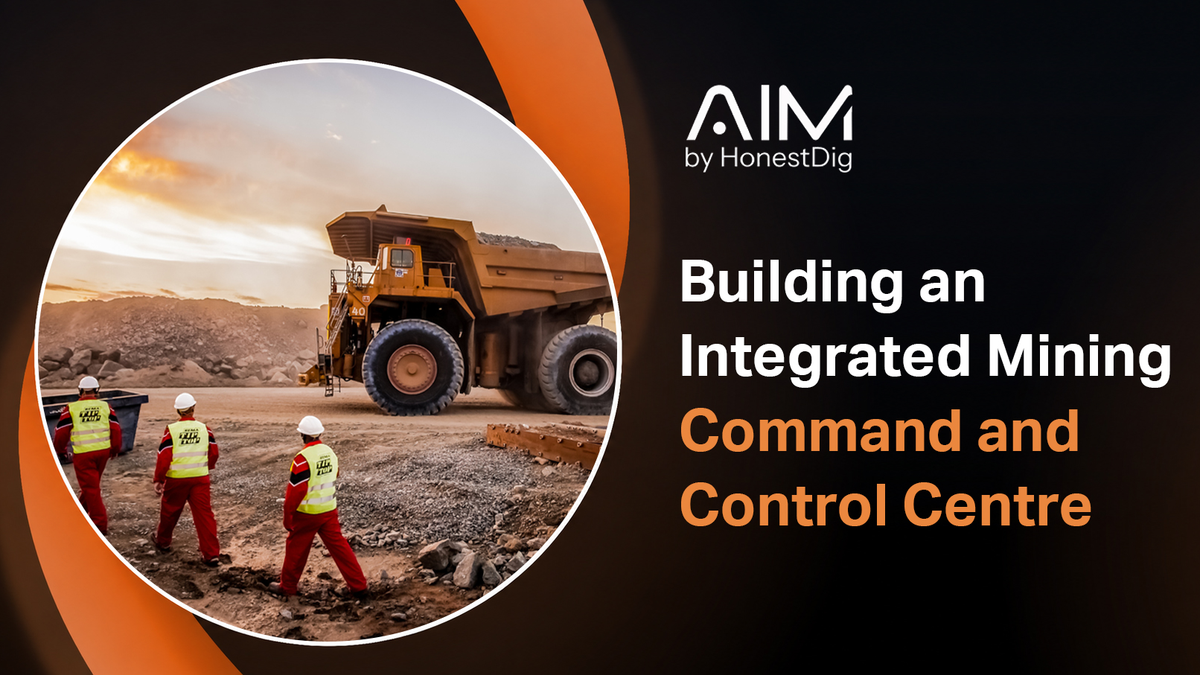 Mining professionals monitoring equipment, production and safety data inside an integrated command and control centre