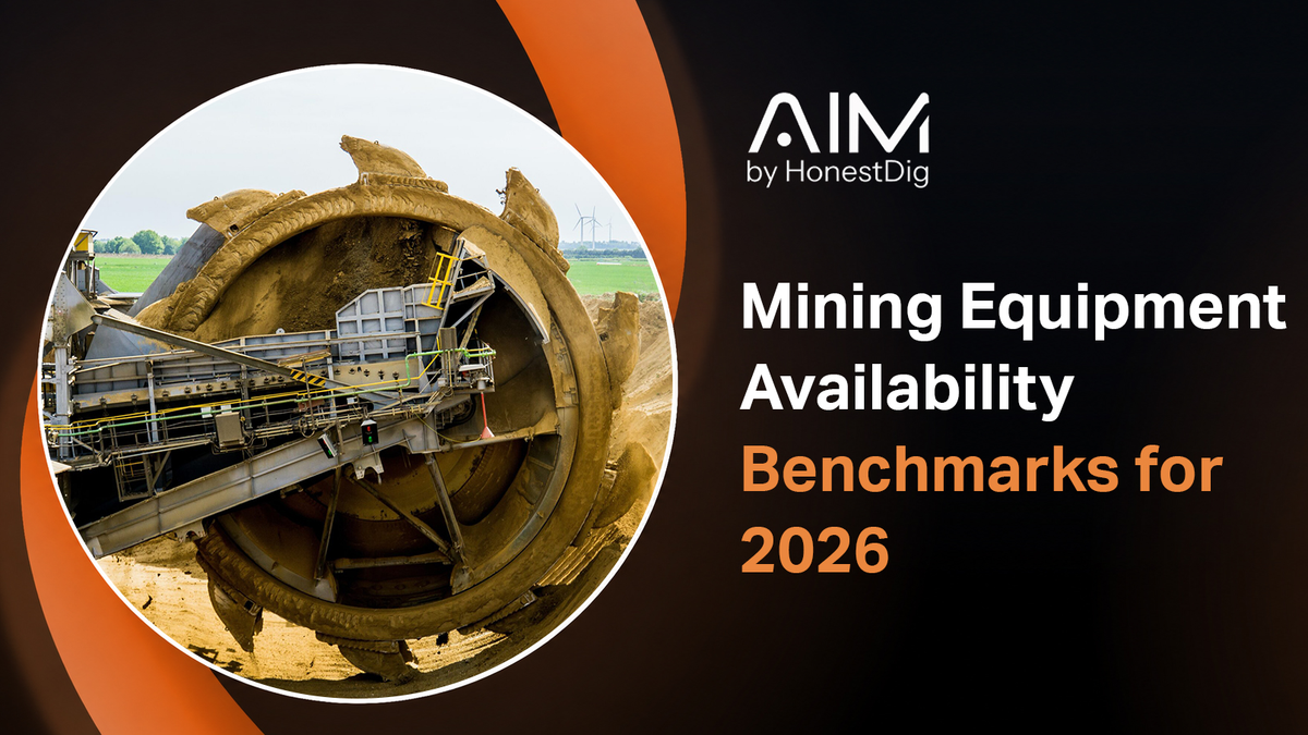 Haul trucks operating at a surface mine with mining equipment availability benchmark data displayed