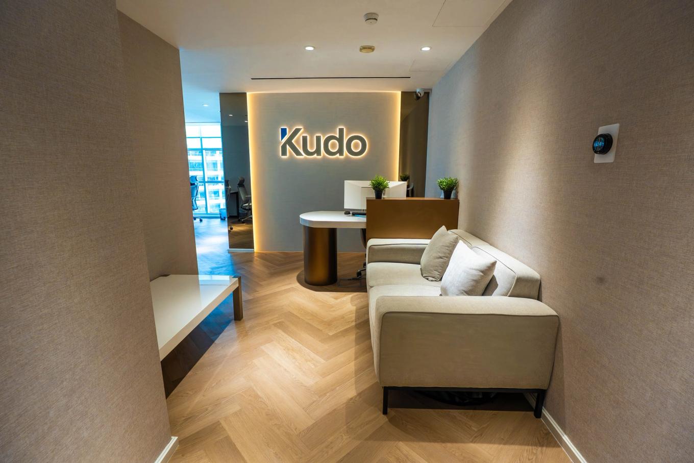 Kudo company signage inside its Dubai office, home to Kudo Financial Services LLC.
