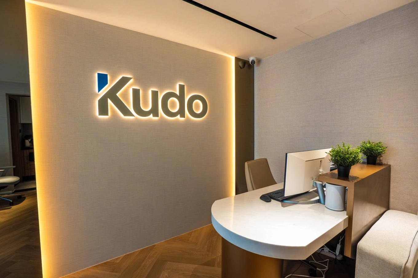 Illuminated Kudo logo at the company’s new Dubai office in Barsha Heights.