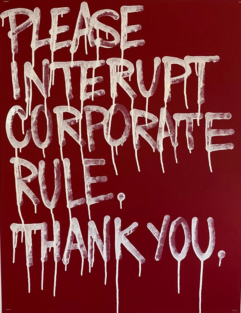 Five words and a courtesy. PANIK's Please Interrupt Corporate Rule. Thank You. delivers its demand in dripping white letters on deep crimson; the politeness of the phrasing sharpening rather than softening the ask. A public notice written in the grammar of the street.