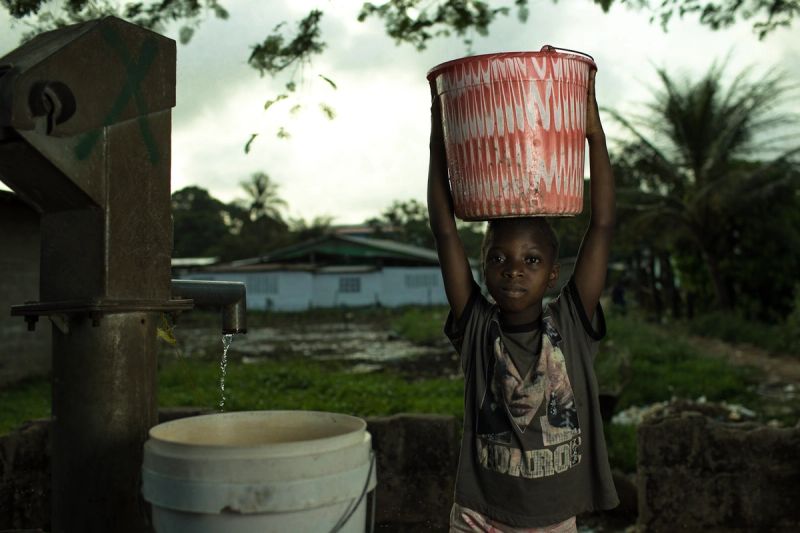 Child Fetching Water at the Village Pump, 1365x2048 px, 2018. © Morgana Wingard