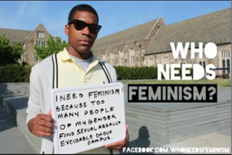 A man of colour, wearing sunglasses, stands on a university campus holding a sign that says: “I need feminism because too many people of my gender find sexual assault excusable on our campuses.” Beside him, the image title reads: “Who needs feminism?”