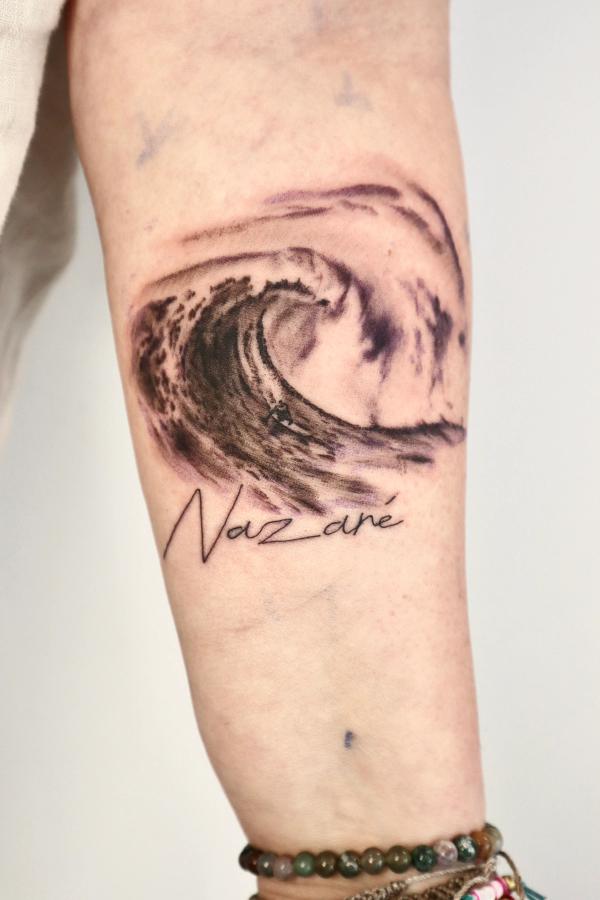 Nazare big wave tattoo