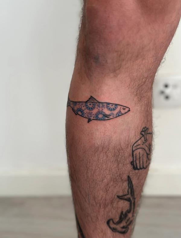 porcelain sardine tattoo