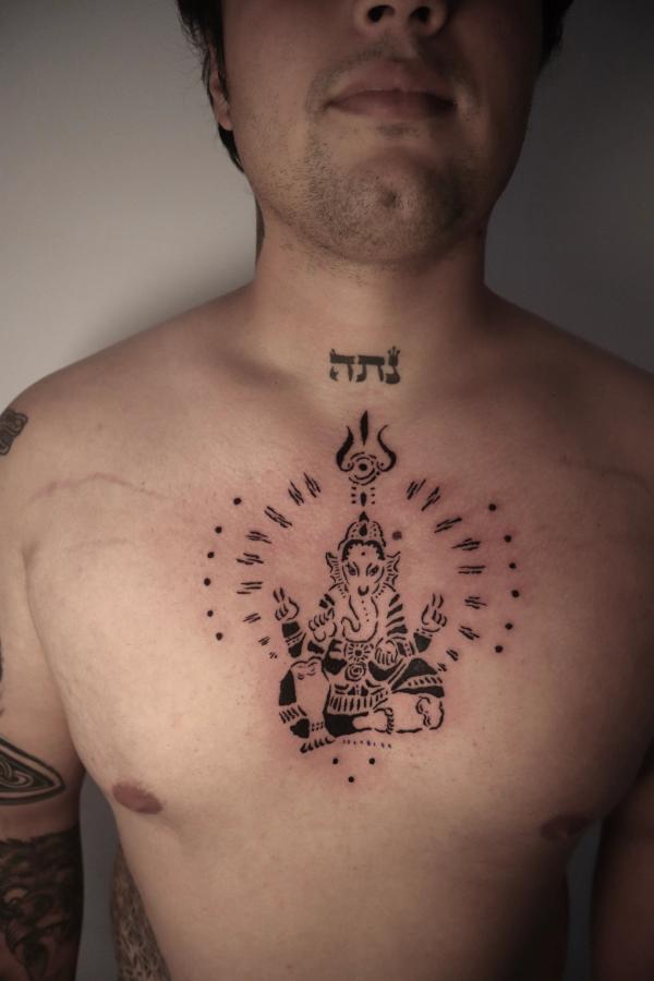 Ganesha Chest Tattoo by Bare Ania