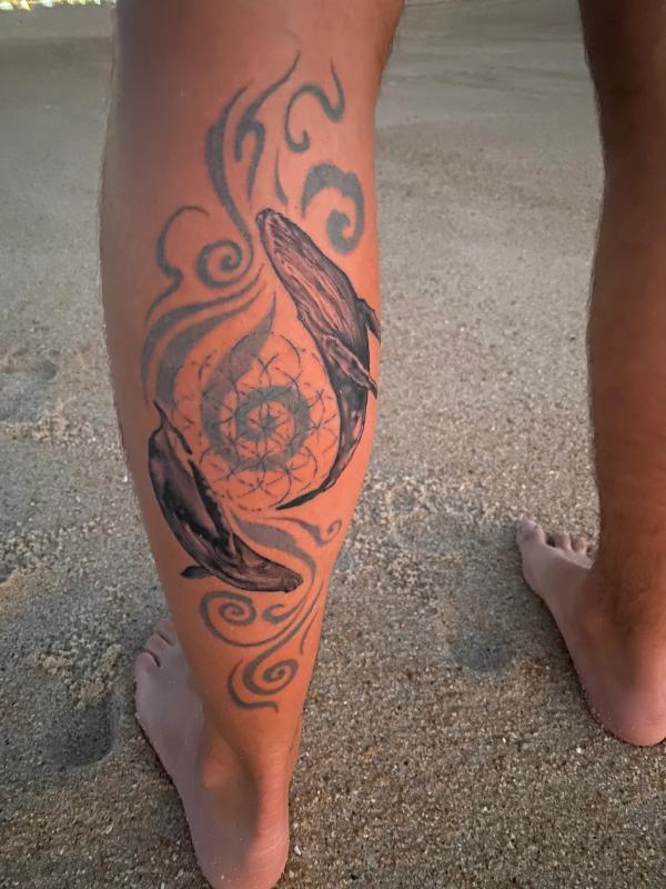 Whales tattoo in mixed style