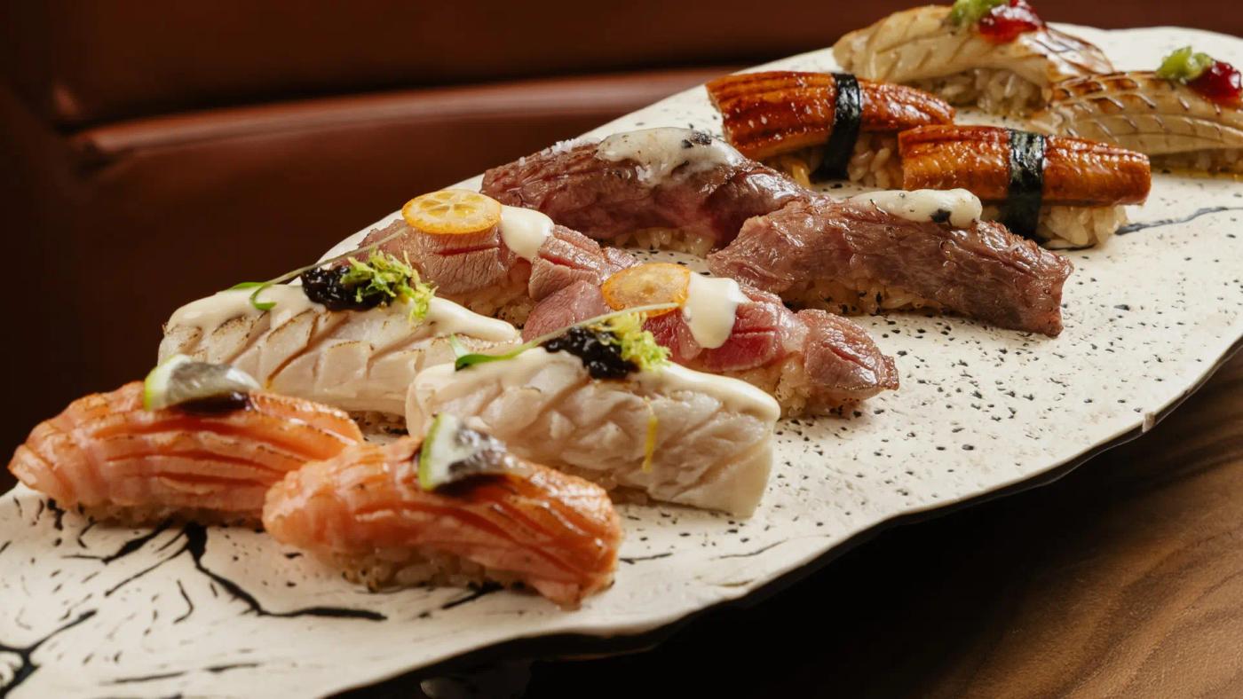 Hamachi (pez limón) en sashimi y nigiri servido en Arko Sushi Restaurant Barcelona con presentación japonesa elegante.