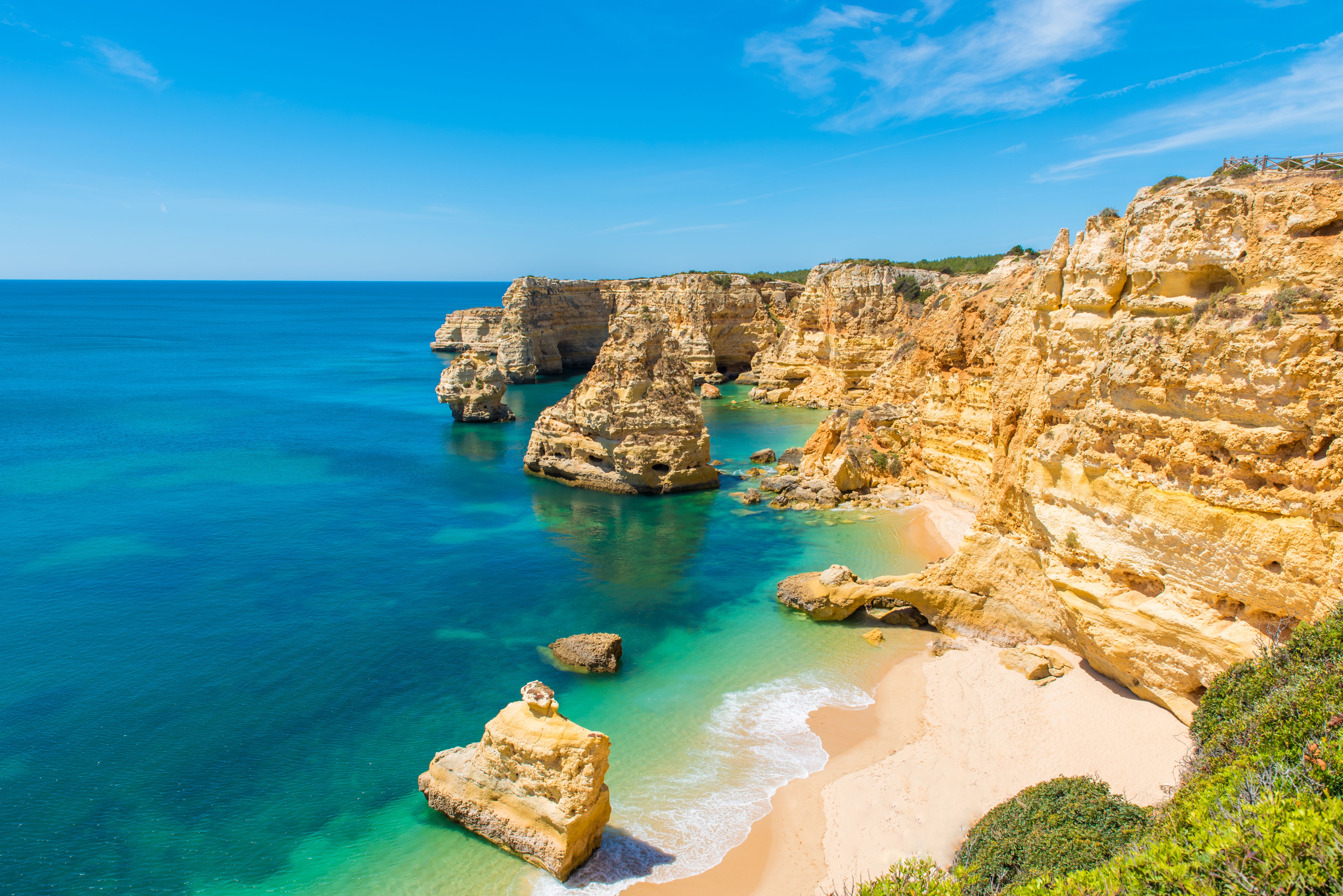 View of Praia da Marinha beach and coastal cliffs in the Algarve