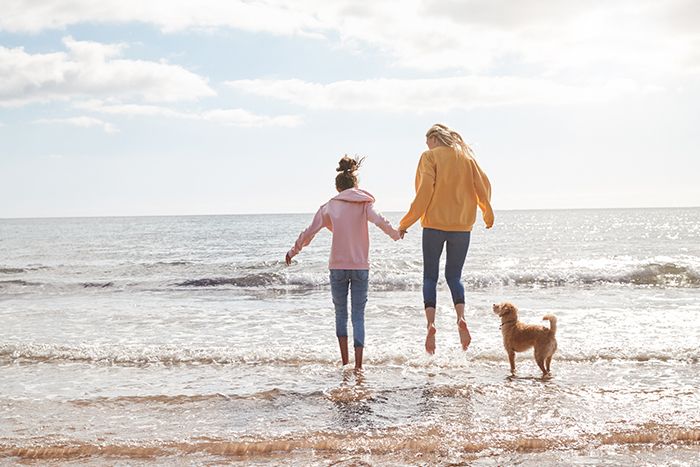 Mother and daughter on the beach