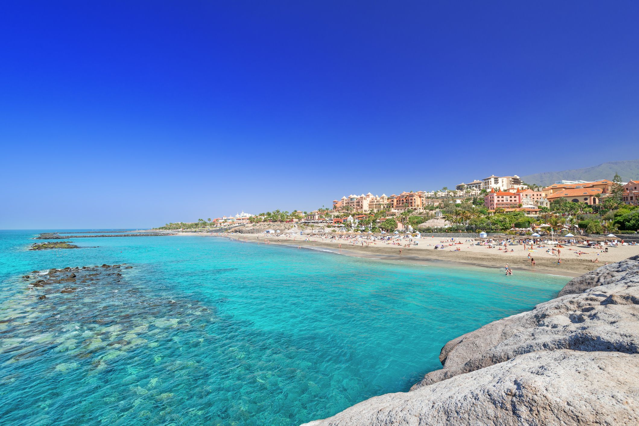 A view of El Duque beach in south Tenerife on a bright, sunny day