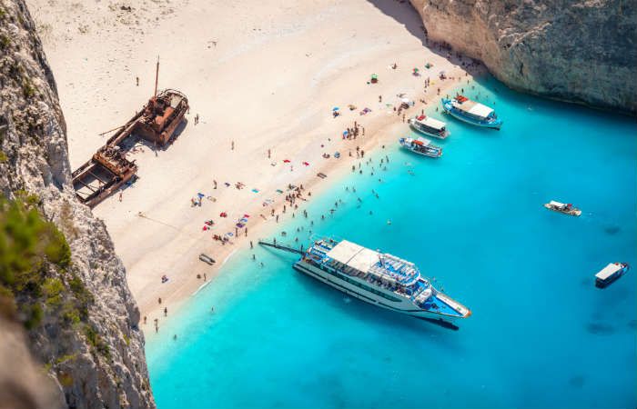 Boats moored at Navagio Beach