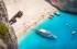 Boats moored at Navagio Beach