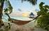 Hammock By Beach In The Maldives
