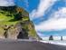 Reynisfjara beach near Vik in southern Iceland with striking headlands and black sand