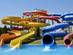 Colourful waterslide tubes at a waterpark