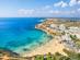 Aerial view over Paradise Bay Beach in Malta