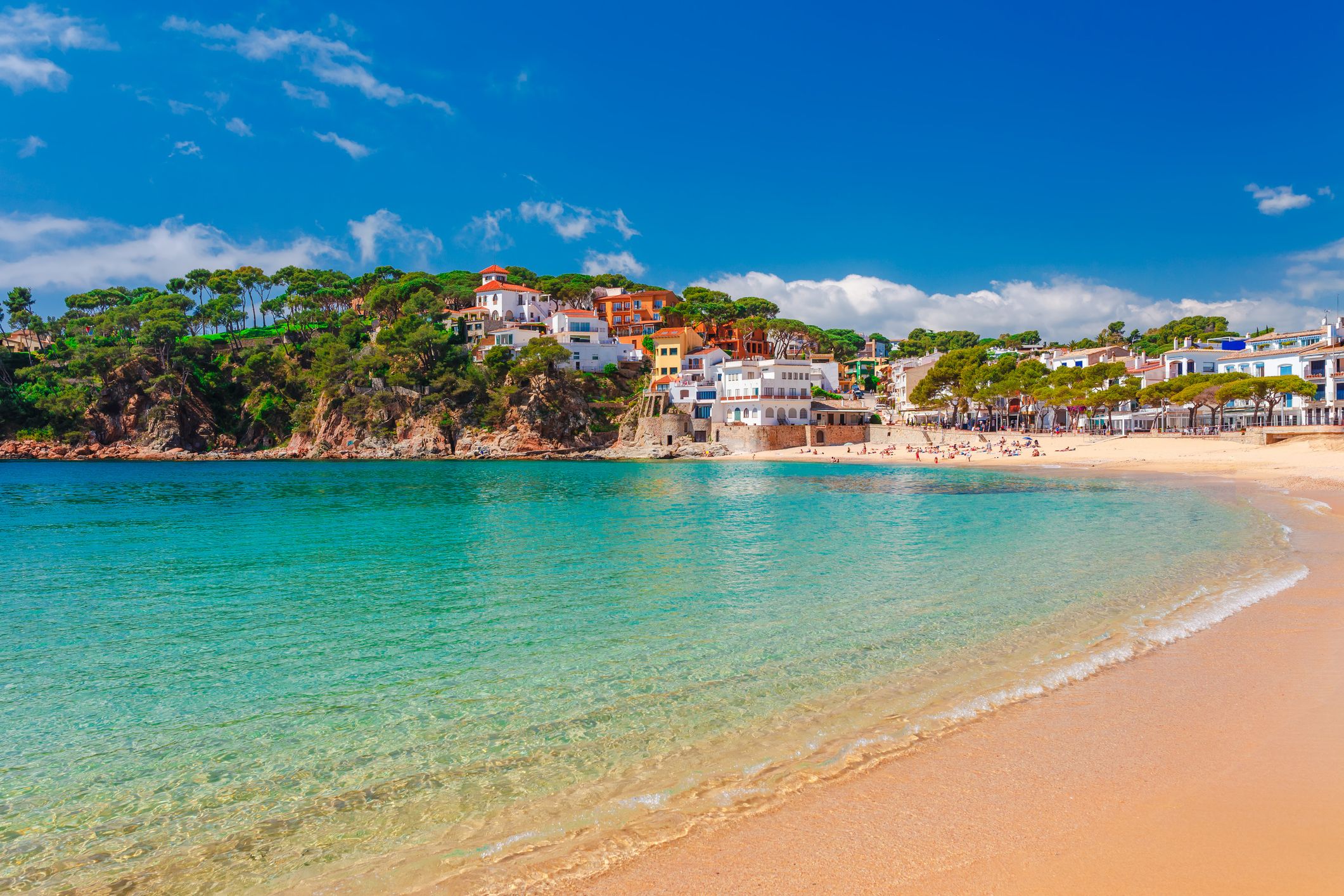 A view of Llafranc beach on a bright sunny day in Costa Brava