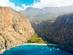 Aerial view over the clear beach and turquoise water of Butterfly Valley in Turkey